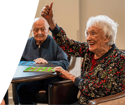Elderly residents enjoying a game together.