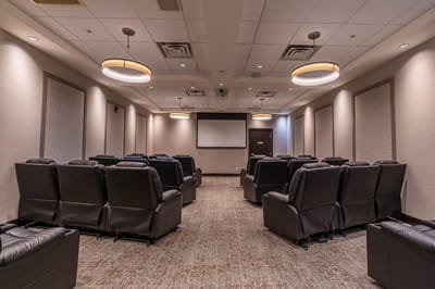 Comfortable seating in a stylish theater room.