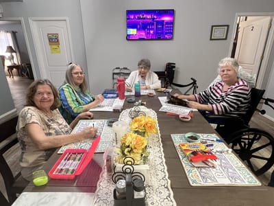 Residents engaged in a crafting activity.