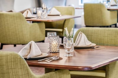 Dining table set with elegant decor.