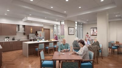 Residents enjoying a meal in a dining area