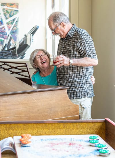Residents enjoying music and drinks together
