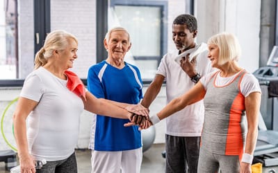 Residents participating in a group exercise activity.
