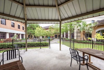 Outdoor seating area with view of gardens