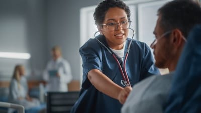 Healthcare professional attending to a patient