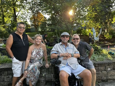 Group of residents enjoying outdoor space.