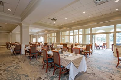 Dining area with tables set for meals
