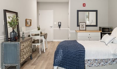 Comfortable private room with furniture
