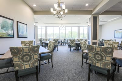 Decorative dining area with patterned chairs