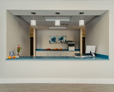 Reception area with flowers and fruit