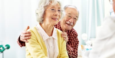 Smiling elderly couple enjoying a conversation