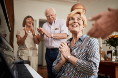 Residents enjoying a musical performance together