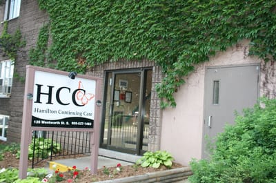 Exterior view of Hamilton Continuing Care building entrance.