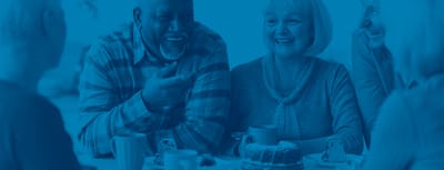 Residents enjoying coffee and dessert together