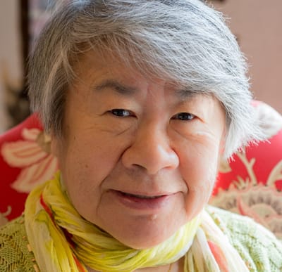 Close-up portrait of a senior woman with a scarf