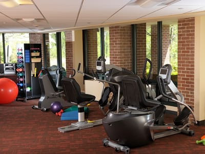 Interior view of a fitness area with gym equipment