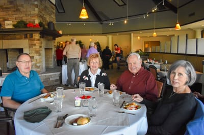 Residents enjoying a meal in the dining area