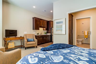 Cozy resident room with a kitchen and accessible bathroom