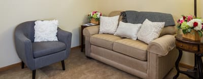 Cozy living room area with flowers and decor