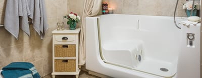 Accessible bathroom with a walk-in tub and decor