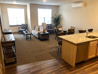 A cozy living room area in a senior living facility