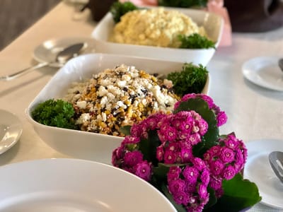 Delicious meal served with colorful flowers