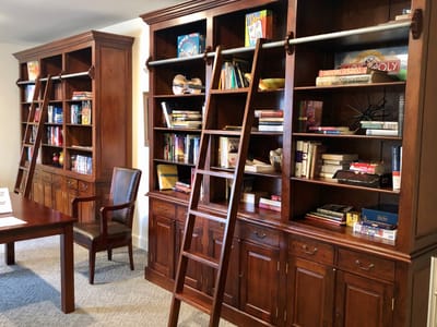 Interior common area with bookshelves and games