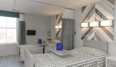 Private room with two beds and modern decor