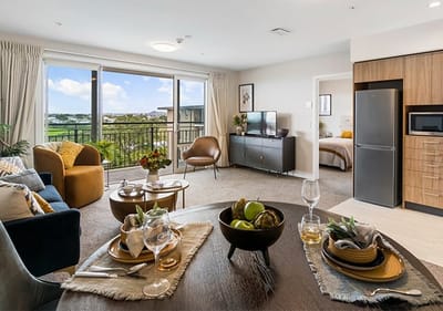 A cozy and modern living space with a view.
