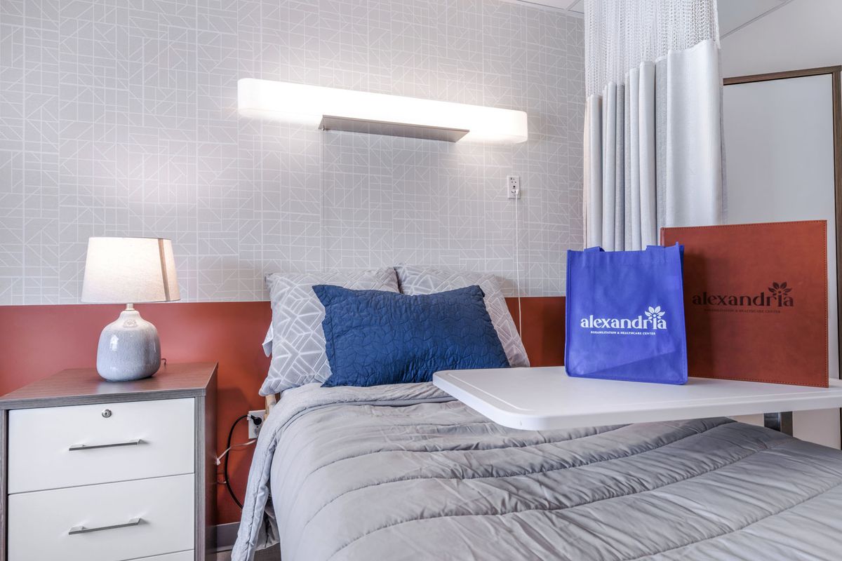 Cozy resident room with essentials and personal items.