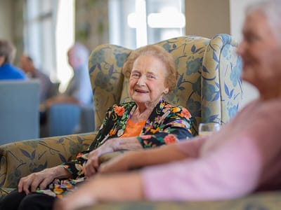 Residents enjoying time together in a common area.