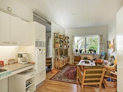 Verdishave, retirement home in Copenhagen, DK — Cozy living area with plants and natural light