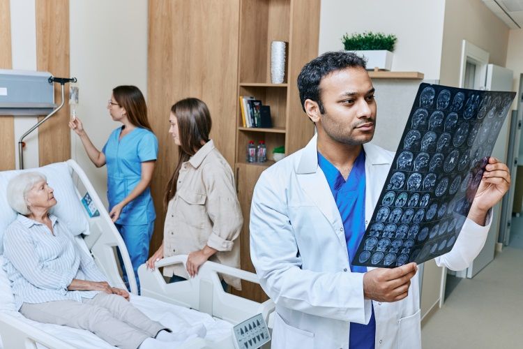 Healthcare professionals engaged with a patient