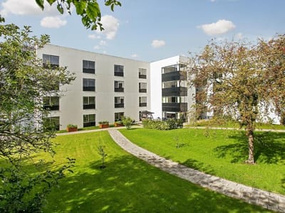 Verdishave, retirement home in Copenhagen, DK — Modern senior living facility with landscaped grounds and pathways