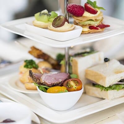 Elegant food presentation with pastries and fruit