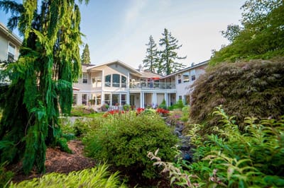 Well-maintained outdoor area with landscaping and building.