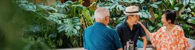 Engaging seniors in a lush outdoor setting.
