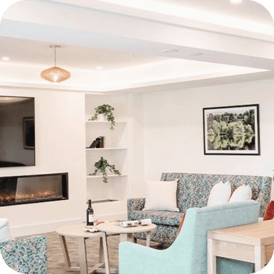 Cozy common area with comfortable seating and fireplace