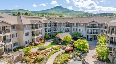 Aerial view of landscaped courtyard and building exterior.