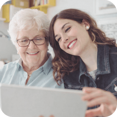 Senior resident enjoying time with a caregiver