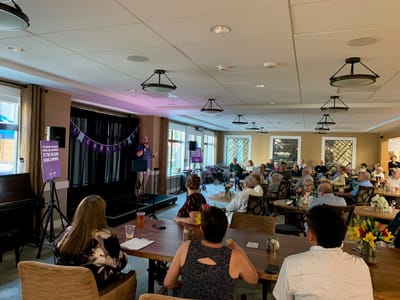 Residents enjoying an event in a common area