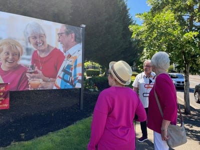 Residents enjoying a cheerful outdoor event.