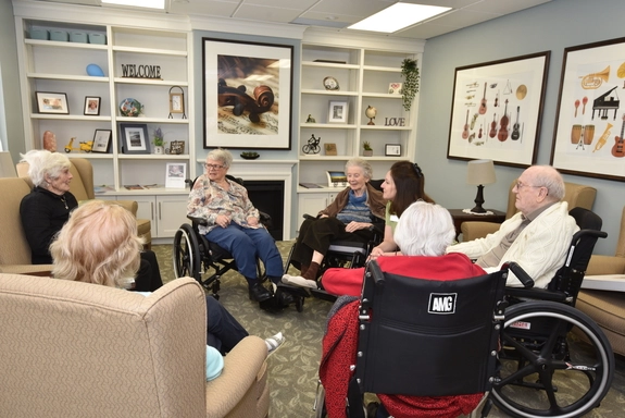 Residents engaged in a group activity in a common area