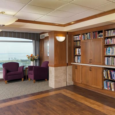 Interior common area with bookshelves and seating