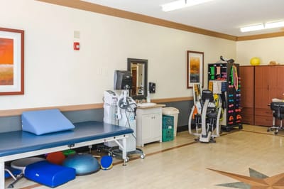 Therapy room with equipment and exercise tools