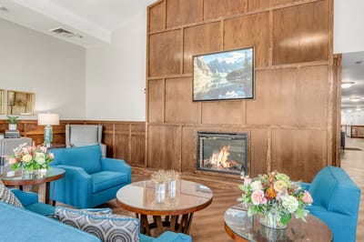 Cozy common area with seating and fireplace
