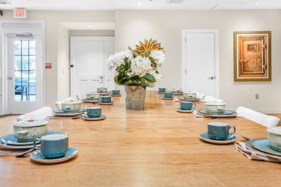 Elegant dining room setup with floral centerpiece