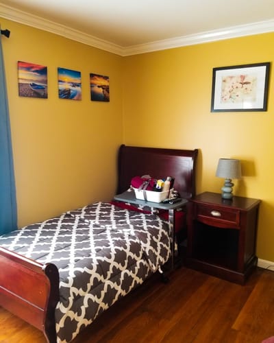 Cozy resident room with bed and decor