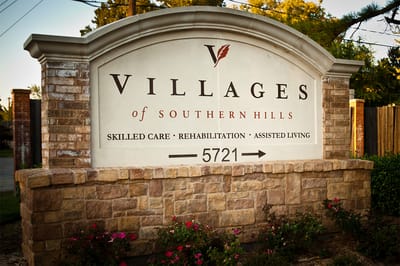 Facility logo sign displaying name and services