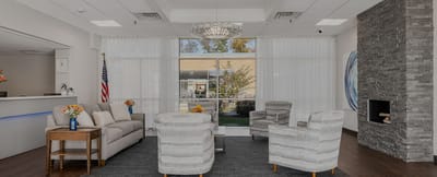 Bright interior of a common area with seating.